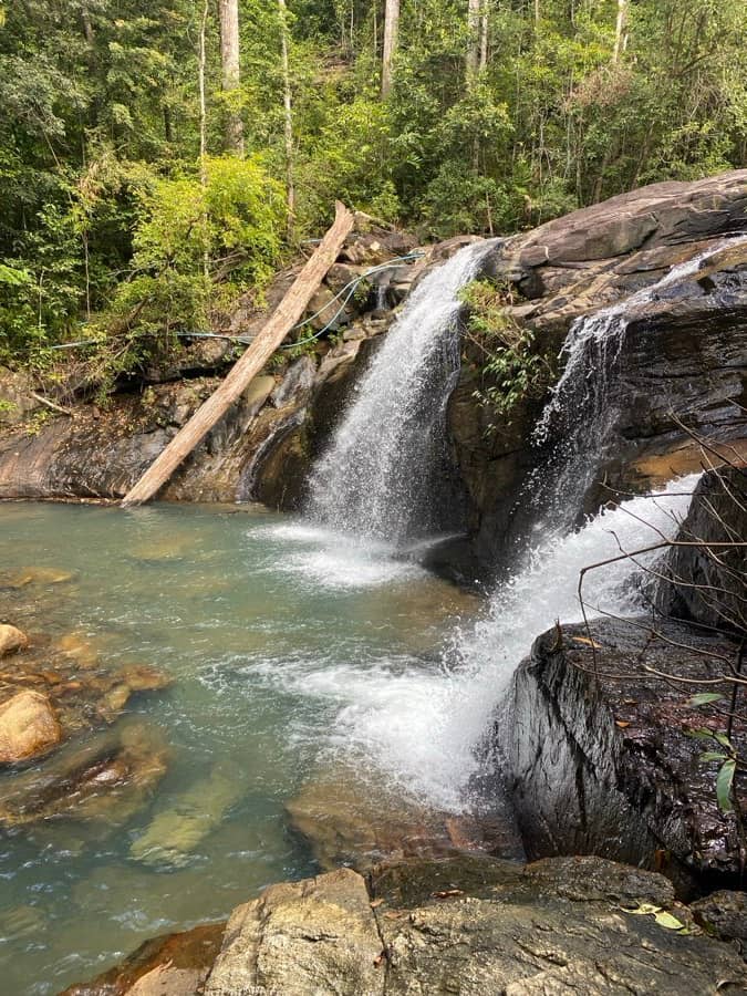 A wide waterfall cascade in lush southern-Thailand jungle
