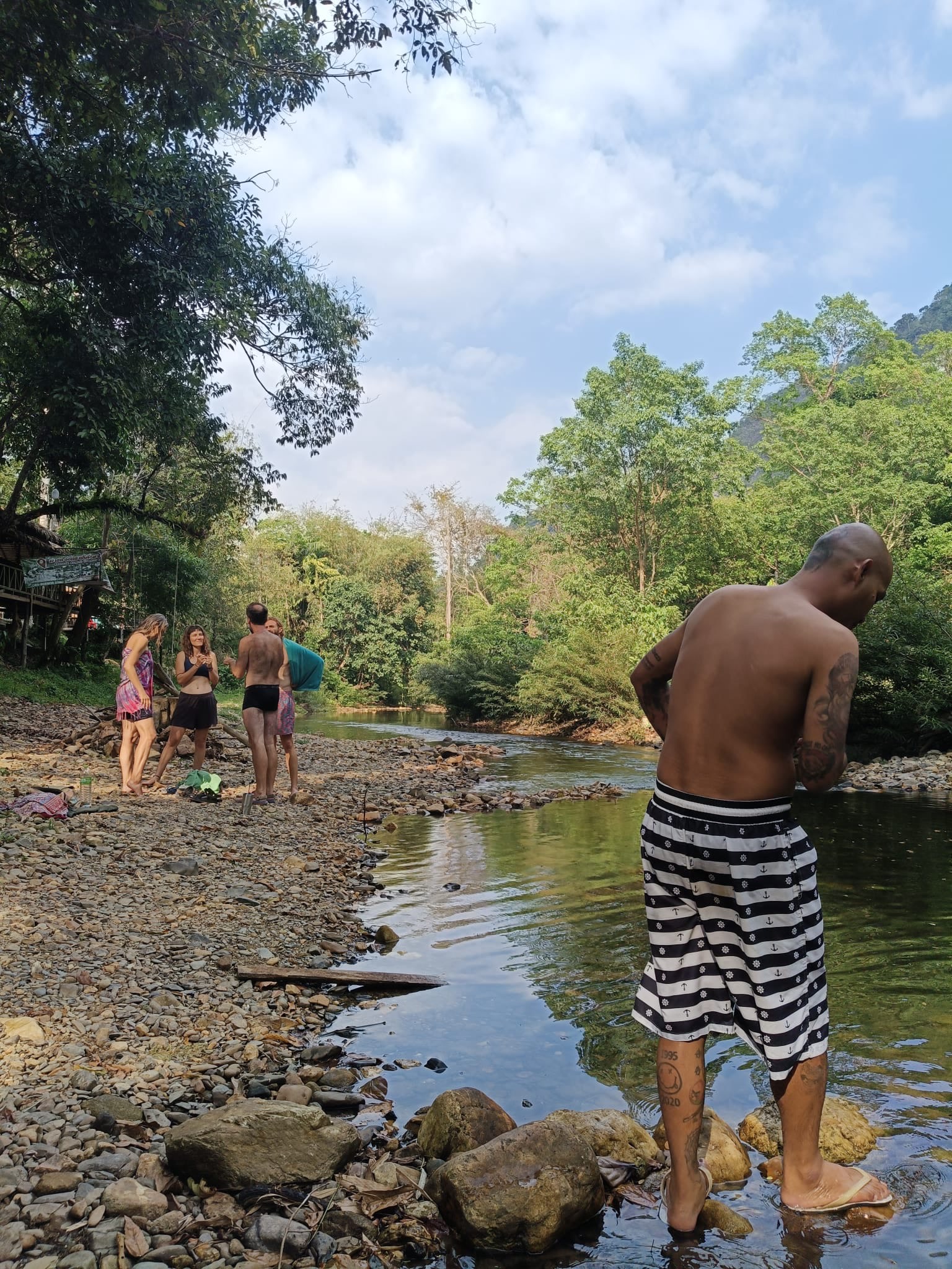 A swim stop on a river beach along the Sok River